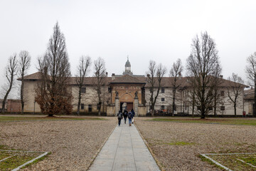 PAVIA, ITALY, DECEMBER 28, 2022 - Entrance of the Certosa of Pavia, Monastery of Santa Maria delle Grazie, the historical monumental complex including a monastery and a sanctuary, near Pavia, Italy