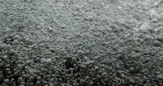 river underwater carrying alluvium in freshwater river in nature with bubbles