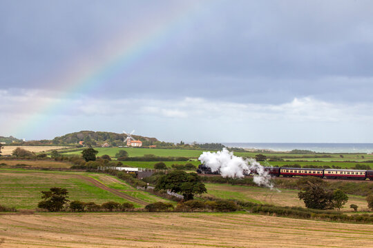 Norfolk steam train and Weybourne windmill rainbow
