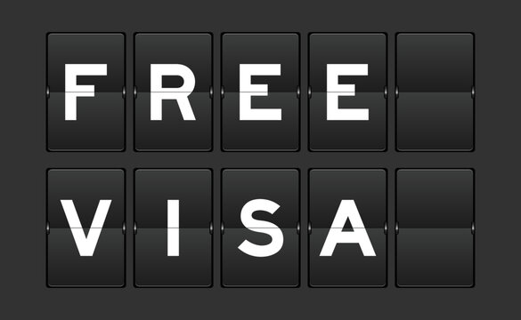 Black color analog flip board with word free visa on gray background