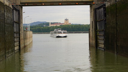 Fototapeta na wymiar Chember lock with cruise ship on river Danube in Melk, Austria