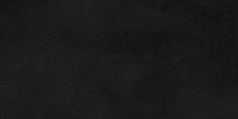 Dark concrete textured wall background.black cement wall texture for interior design. dark edges.copy space for add text.