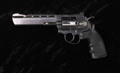 cowboy revolver on a black background