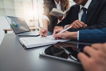 Financial analyst analyzes business people investment consultant analyzing company financial report working with documents graphs. Stock Market Tax Fund Finance concept