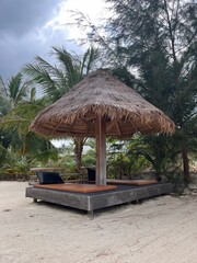 thai culture buddhism sculpture. flowers red bungalows on the beach Koh Phangan