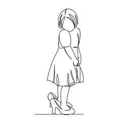 little girl in mother's shoes