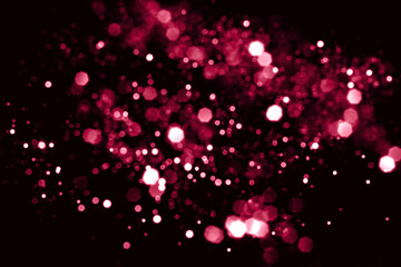 Viva magenta blurred abstract bokeh lights background. Snowy shiny glitter sparkle stars for holiday celebrate