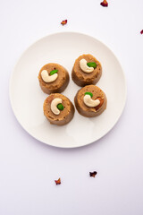 Atta Pinni is a traditional Punjabi winter delicacy, sweet made with wheat flour, ghee, dry fruits