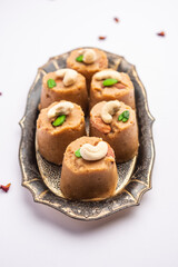 Atta Pinni is a traditional Punjabi winter delicacy, sweet made with wheat flour, ghee, dry fruits