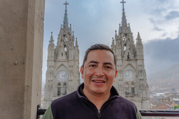 portrait of a man in front of the basilica of the national vote quito ecuador - obrazy, fototapety, plakaty
