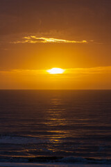 Colorful sunrise, with clouds, over the sea