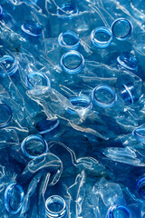 Used plastic bottle background. Recycle plastic trash and waste to protect the ecology and preserve the natural environment.