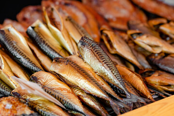 Selection of assorted home made smoked fish on a farmers market in Vilnius, Lithuania.