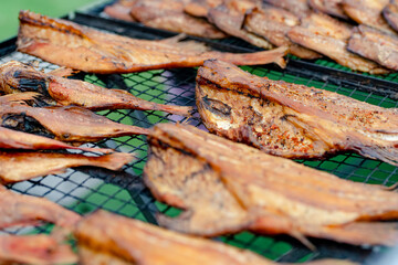 Selection of assorted home made smoked fish on a farmers market in Vilnius, Lithuania.