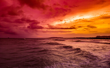 Fototapeta na wymiar sunset on the beach, Beautiful orange sky atmosphere on Seashore