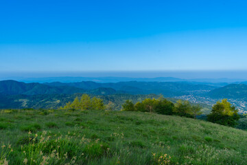 Sunrise over River Teresva and Dubove village from Apetska mountain, Carpathians mountains, Ukraine.