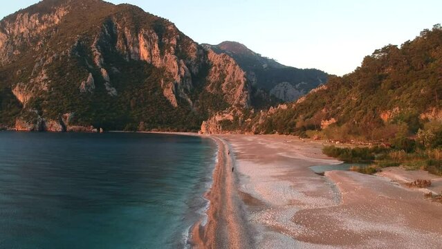View from above to Cirali beach and Olimpos mountain in a sunset light. Kemer, Antalya, Mediterranean region, Turkey, Lycia.