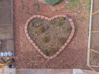 Heart Shaped Garden in Suburban Home from Above During the Da