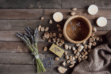 Healthy lavender aromas for wellness and beauty on rustic wood. Top view. Background for...