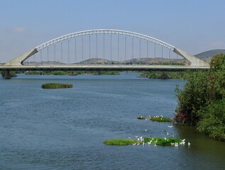 Fototapeta premium Guardiana river and Lusitania bridge in Merida, Extremadura - Spain 