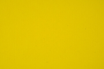Yellow colored paper with strong structure as a background