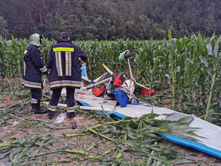 Hang glider crashes into a cornfield after a flight accident. The remains of the aircraft after the...