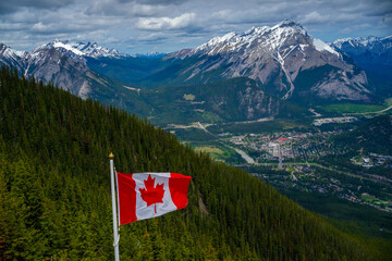 Canadian flag, rocky mountaineer, lake Banff