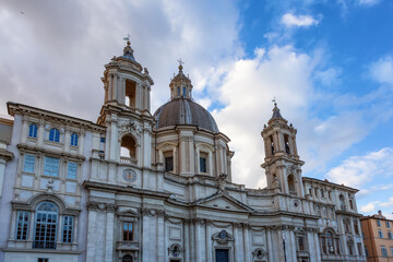 Fototapeta na wymiar Sant'Agnese in Agone in Piazza Navona. Historic Landmark in Rome, Italy. Cloudy Sky.