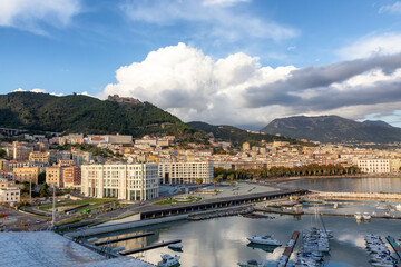 Fototapeta premium Touristic City by the Sea. Salerno, Italy. Aerial View. Cityscape and mountains background
