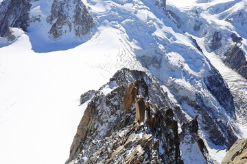 Viewpoint from the Aiguille du Midi which  is a 3,842-metre-tall mountain in the Mont Blanc massif within the French Alps