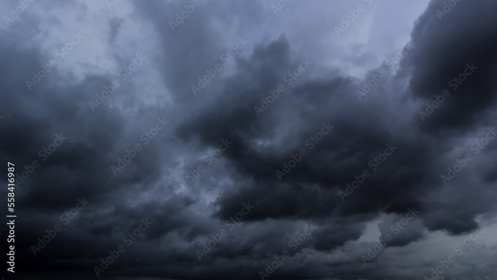 Aufkleber The dark sky with heavy clouds converging and a violent storm before the rain.Bad or moody weather sky and environment. carbon dioxide emissions, greenhouse effect, global warming, climate change