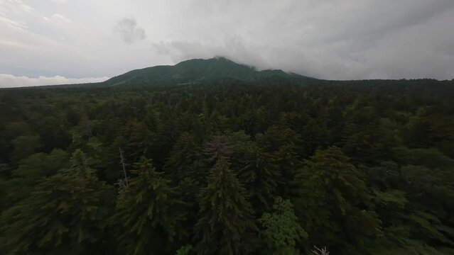 FPV drone clouds over the mountains in Rishiri Island, Hokkaido Japan