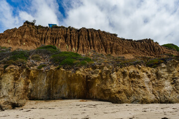 El Matador Beach along the East Pacific Coast Highway in Malibu California. The beach is a collection cliff-foot beaches and bluff top view of the eroding formations, sea stacks, caves and arches. 