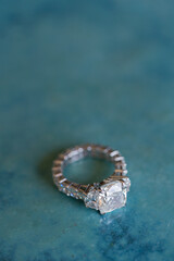 Diamond ring on blue background,wedding ring.