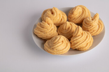 photo of several meringue cakes lying on a plate