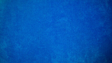 Dark blue velvet fabric texture used as background. Tone color blue cloth  background of soft and...