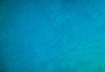 Light blue velvet fabric texture used as background. Tone color blue cloth  background of soft and smooth textile material. There is space for text and for all types of design work..