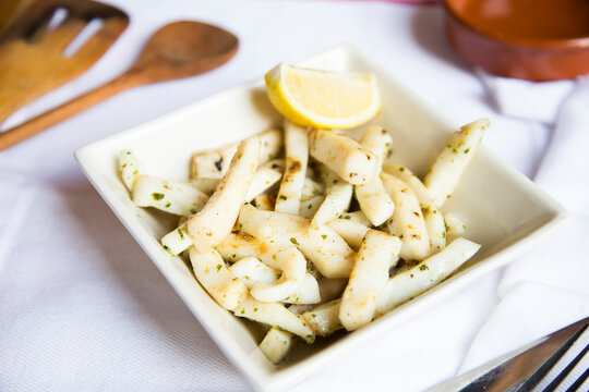 Puntas de calamar al ajillo. Grilled squid tips with garlic. Traditional Spanish tapa.