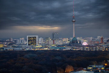 Moody winter dusk view of the skyline of Berlin, Germany, over the Tiergarten to the Mitte district