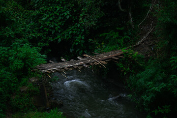 view of the river with the water flowing fast after the rain fell in the afternoon
