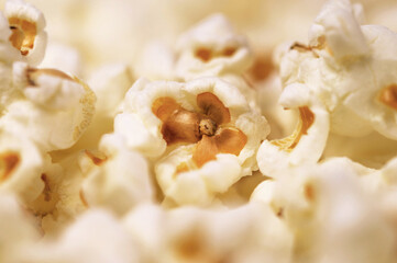 Fresh popcorn close up. Macro background of popcorn flakes.