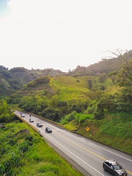 sunset on a Colombian road. La Romelia-El Pollo variant, Colombian road through the mountains.