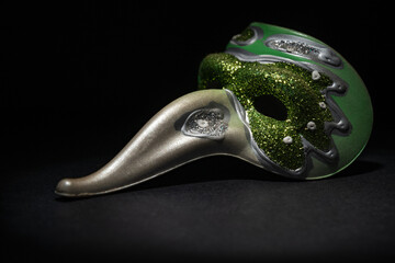 mask of a plague doctor at the Venice Carnival. dark background