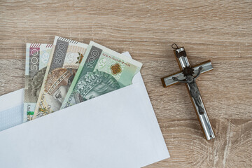 Pastoral visit or Kolęda, Catholic tradition after Christmas in Poland. Cross and envelope with...