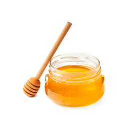 Fresh honey in a jar with a wooden dipper on a white isolated background.