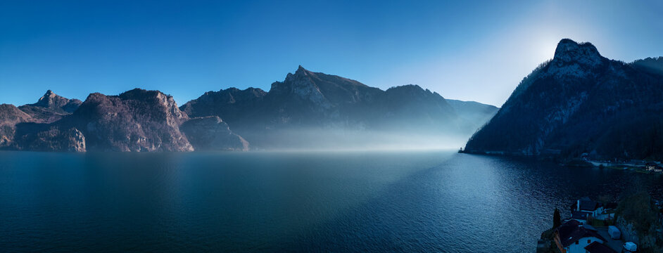 Panorama of salzkammergut mountains with interesting sunbeam, austria