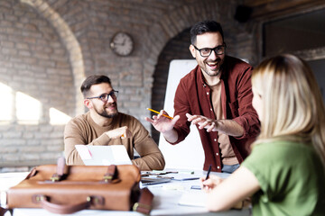 Group of smart people working together in office