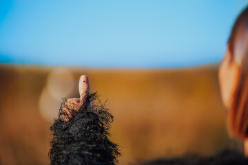 person holding hands up