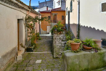 A narrow street among the old houses of Rapolla, a village in the province of Potenza in Italy.