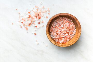 Pink himalayan salt in bowl. Top view.